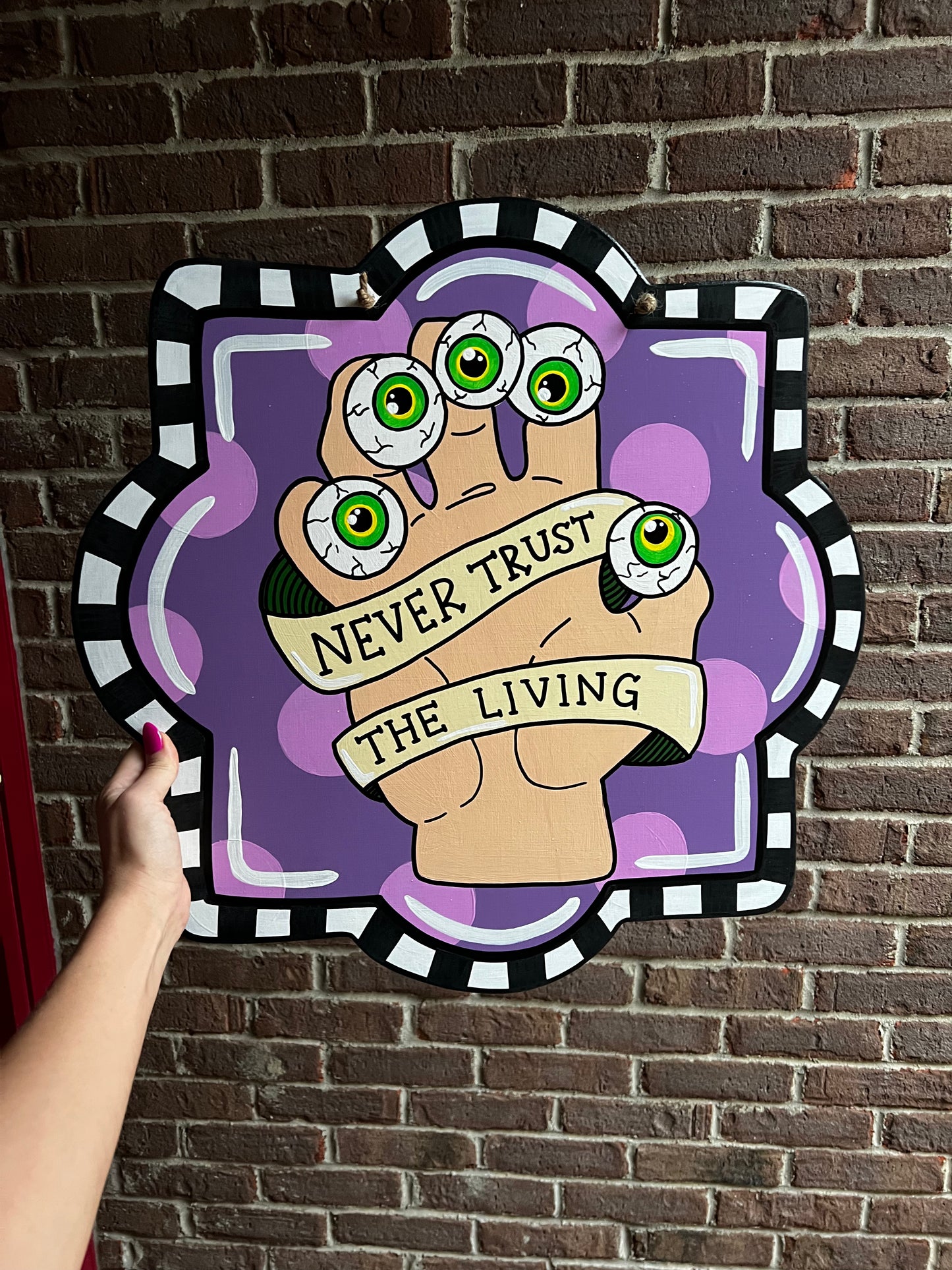 Never Trust The Living Door Hanger - Preorder